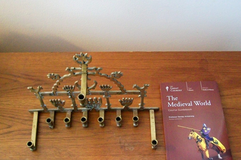 An imported brass menorah for Passover, and “The Medieval World,” a CD set (with guidebook) from the Great Courses.